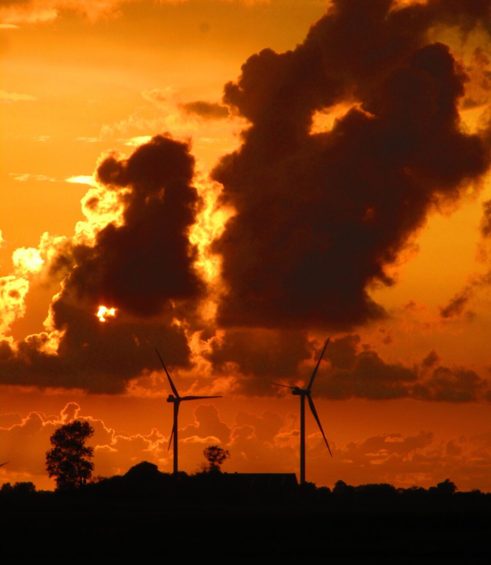 silhouette-windmill-against-dramatic-sky-sunset